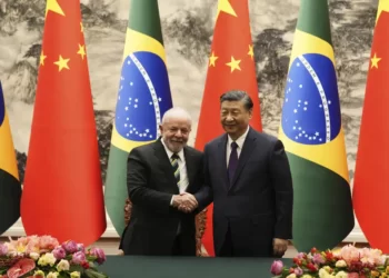 Lula Meets Xi Jinping In Pursuance Of Strong Relations 2 Brazilian President Luiz Inacio Lula da Silva, left, shakes hands with Chinese President Xi Jinping after a signing ceremony held at the Great Hall of the People in Beijing, China, Friday, April 14, 2023.