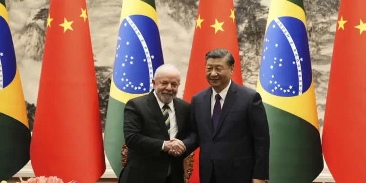 Lula Meets Xi Jinping In Pursuance Of Strong Relations 1 Brazilian President Luiz Inacio Lula da Silva, left, shakes hands with Chinese President Xi Jinping after a signing ceremony held at the Great Hall of the People in Beijing, China, Friday, April 14, 2023.