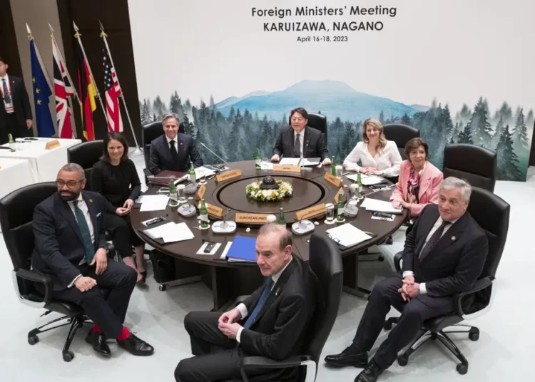 Clockwise from left, British Foreign Secretary James Cleverly, German Foreign Minister Annalena Baerbock, U.S. Secretary of State Antony Blinken, Japan's Foreign Minister Yoshimasa Hayashi, Canadian Foreign Minister Melanie Joly, French Foreign Minister Catherine Colonna, Italy's Foreign Minister Antonio Tajani and Deputy Secretary-General of the European External Action Service (EEAS) Enrique Mora pose for photographs at the start of the fifth working session of a G7 Foreign Ministers' Meeting at the Prince Karuizawa hotel in Karuizawa, Japan Tuesday, April 18, 2023.