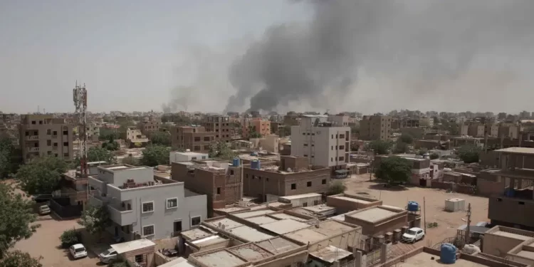 Smoke is seen rising from Khartoum's skyline, Sudan, Sunday, April 16, 2023.