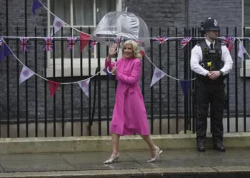 US First Lady Jill Biden waves to the media as she arrives in Downing Street to meet Akshata Murty wife of the British Prime Minister Rishi Sunak in London, Friday, May 5, 2023.