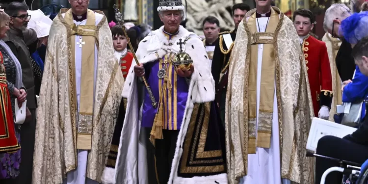 Monarchy Or Elected Head Of State: The British Dilemma 1 Britain's King Charles III wearing the Imperial state Crown and carrying the Sovereign's Orb and Sceptre leaves Westminster Abbey after coronation in central London Saturday, May 6, 2023.