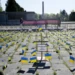 Poland: Ukrainian Flags Block Russian Envoy’s Path To Soviet Soldiers Cemetery 12 Activists set up an installation representing Russian atrocities against Ukraine, in Warsaw, Poland, on Tuesday May 9, 2023.