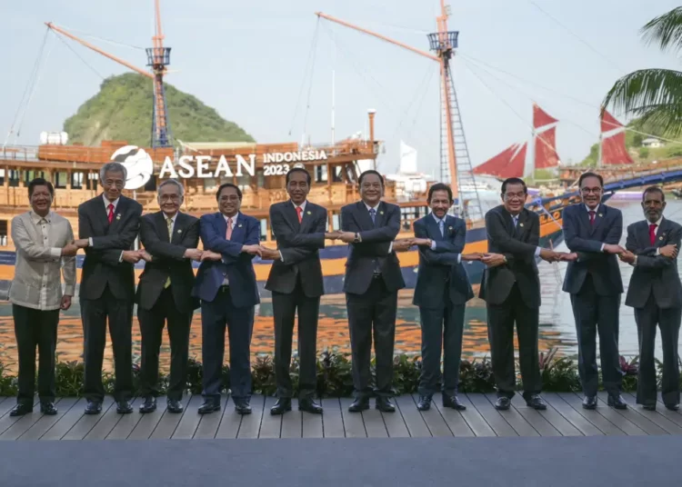 ASEAN Leaders Decry Attack On Aid Convoy In Myanmar 1 From left to right, Philippine President Ferdinand Marcos Jr., Singapore's Prime Minister Lee Hsien Loong, Thailand's Deputy Prime Minister and Foreign Minister Don Pramudwinai, Vietnam's Prime Minister Pham Minh Chinh, Indonesian President Joko Widodo, Laotian Prime Minister Sonexay Siphandone, Brunei's Sultan Hassanal Bolkiah, Cambodia's Prime Minister Hun Sen, Malaysian Prime Minister Anwar Ibrahim and East Timorese Prime Minister Taur Matan Ruak hold hands for a family photo during the 42nd ASEAN Summit in Labuan Bajo, East Nusa Tenggara, Indonesia, Wednesday, May 10, 2023.