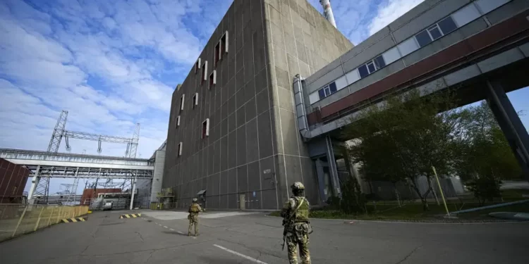 Ukraine’s Atomic Energy Company Warns Of Potential “Catastrophic Lack Of Qualified Personnel” 1 Russian servicemen guard an area of the Zaporizhzhia Nuclear Power Station, the largest nuclear power plant in Europe and among the 10 largest in the world in Enerhodar, Zaporizhzhia region, in territory under Russian military control, southeastern Ukraine, on May 1, 2022.
