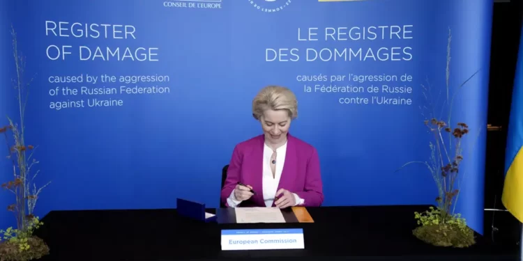 European Commission President Ursula von der Leyen prepares to sign the Register of Damage during the Council of Europe summit in Reykjavik, Iceland, Wednesday, May 17, 2023.