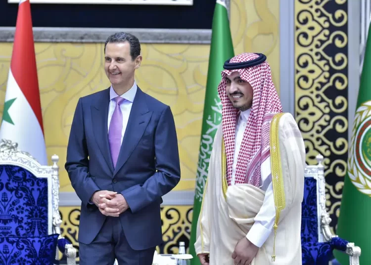 Syria’s Assad Urges Arab Leaders To Rearrange Their Affairs With Little Foreign Interference 1 In this photo provided by Saudi Press Agency, SPA, Syrian President Bashar Assad, is accompanied by Prince Badr Bin Sultan, deputy governor of Mecca, upon his arrival at Jeddah airport, Saudi Arabia, Thursday, May 18, 2023, ahead of the Arab summit.