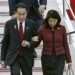 Japanese Prime Minister Fumio Kishida, left, and his wife Yuko arrive at Hiroshima airport for the G-7 summit in Hiroshima, western Japan, Thursday, May 18, 2023.