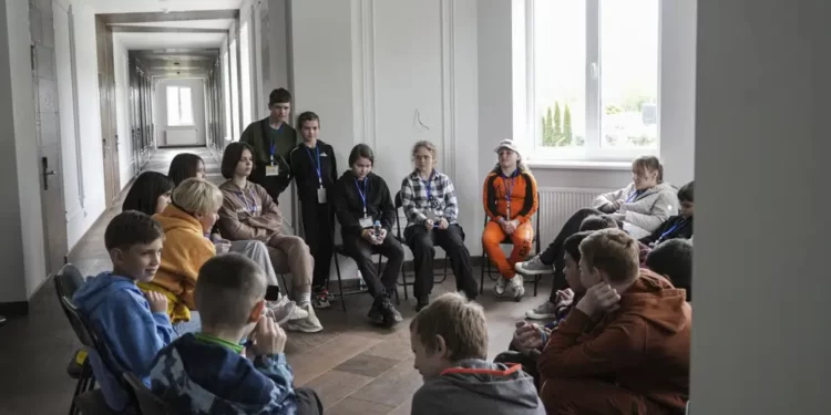 Ukrainian Children Of War 1 Children attend a group therapy class at the recovery camp for children and their mothers affected by the war near Lviv, Ukraine.
