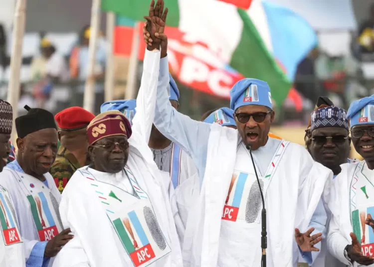 Nigerians Set For Their New President, Will Tinubu Deliver 1 Nigeria's President, Muhammadu Buhari, center right, Bola Ahmed Tinubu, presidential candidate of the All Progressives Congress, Nigeria ruling party, center left.
