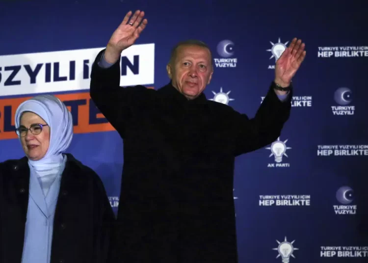 Turkey: Erdogan Says He Would Accept Presidential Election Runoff 1 Turkish President Recep Tayyip Erdogan, right, and his wife, Emine, acknowledge supporters at the party headquarters, in Ankara, Turkey, early Monday, May 15, 2023.