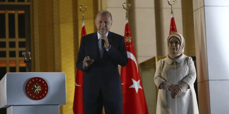 Erdogan Emerges Victorious In Turkish Runoff Votes, Gains New Five Year Term 1 Turkish President and People's Alliance's presidential candidate Recep Tayyip Erdogan, left, makes a speech next to his wife, Emine, at the presidential palace, in Ankara, Turkey, Sunday, May 28, 2023.