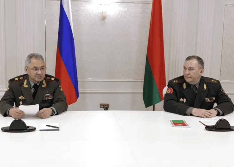 Russian Defense Minister Sergei Shoigu, left, and Belarusian Defense Minister Viktor Khrenin speak to the media after a session of the Council of Defense Ministers of the Collective Security Treaty Organization (CSTO) in Minsk, Belarus, Thursday, May 25, 2023.
