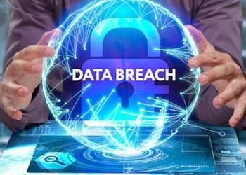 Business, Technology, Internet and network concept. Young businessman shows the word on the virtual display of the future: Data breach