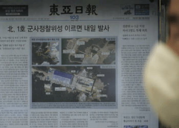 A local newspaper showing file images of the Sohae Satellite Launching Station in Tongchang-ri, North Korea, is displayed in Seoul, South Korea, Tuesday, May 30, 2023.