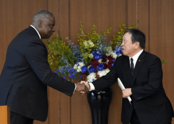 U.S. Defense Secretary Lloyd Austin, left, and Japanese Defense Minister Yasukazu Hamada shake hands at the end of a joint press conference after their meeting at the Defense Ministry in Tokyo Thursday, June 1, 2023.