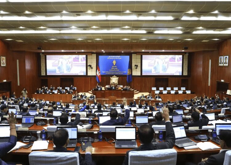 Cambodian Lawmakers Approve Extensive Amendments to Election Law 1 In this photo released by De Ratha/Cambodia National Assembly, Cambodian lawmaker raise their hands to approve amending the country’s election law at the National Assembly, in Phnom Penh, Cambodia, Friday, June 23, 2023.