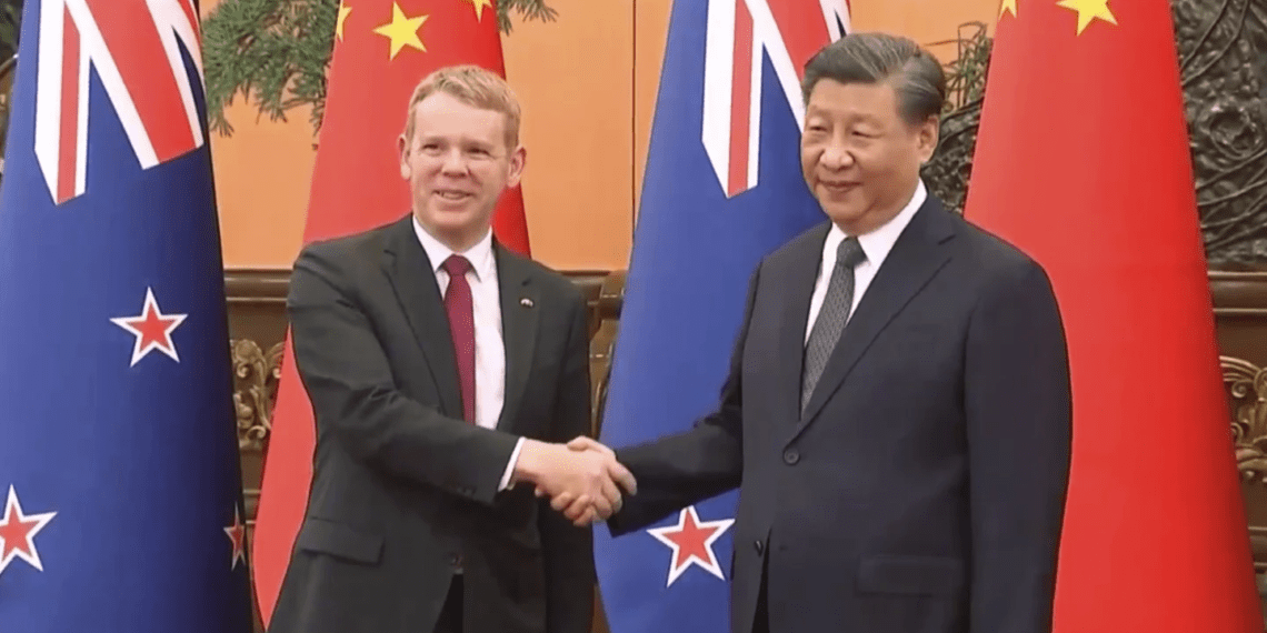 New Zealand Prime Minister(left) shakes hands with Chinese leader, Xi Jinping.