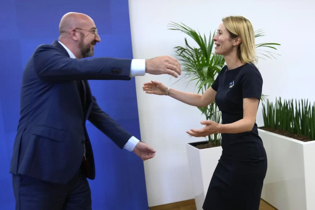 EU Council President Charles Michel left greets Estonias Prime Minister Kaja Kallas