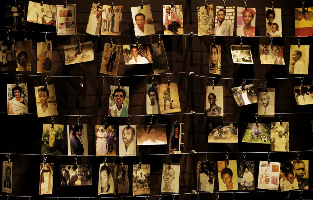 Family photographs of some of those who died hang on display in an exhibition at the Kigali Genocide Memorial centre in the capital Kigali Rwanda
