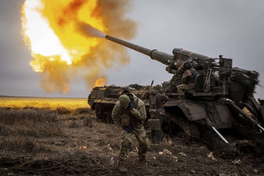 Ukrainian artillerymen fire a 2S7 Pion cannon toward Russian fortifications inside the city of Kreminna Ukraine