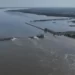 Russia Declines UN’s Aids For Kakhovka Dam Victims 11 Water flows over the collapsed Kakhovka Dam in Nova Kakhovka, in Russian-occupied Ukraine.
