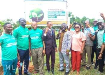 Deputy Minister for Lands and Natural Resources responsible for Lands and Forestry,  Benito Owusu-Bio and rotary club members.