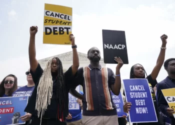 People demonstrate in front of Supreme Court on Friday, June 30, 2023.