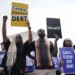 People demonstrate in front of Supreme Court on Friday, June 30, 2023.