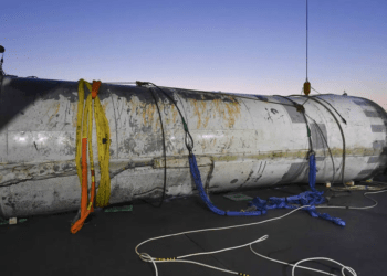 This photo provided by South Korea's Defense Ministry shows an object salvaged by South Korea's military that is presumed to be part of the North Korean space-launch vehicle that crashed into sea following a launch failure, in West Sea, South Korea.