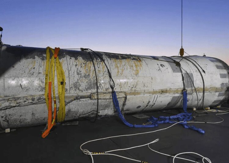 This photo provided by South Korea's Defense Ministry shows an object salvaged by South Korea's military that is presumed to be part of the North Korean space-launch vehicle that crashed into sea following a launch failure, in West Sea, South Korea.