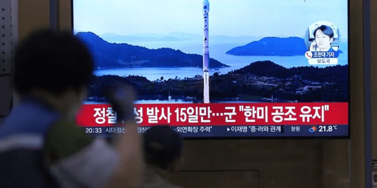 A TV screen shows a report of North Korea's missile launch with file image during a news program at the Seoul Railway Station in Seoul, South Korea, Thursday, June 15, 2023.