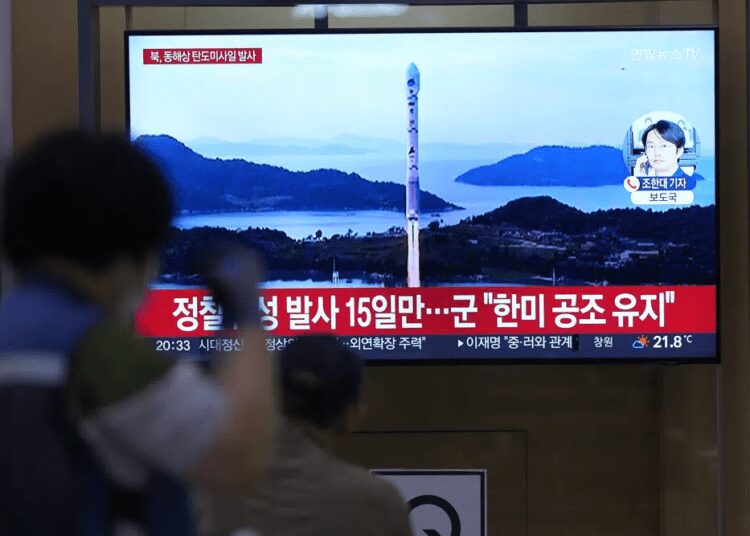 A TV screen shows a report of North Korea's missile launch with file image during a news program at the Seoul Railway Station in Seoul, South Korea, Thursday, June 15, 2023.