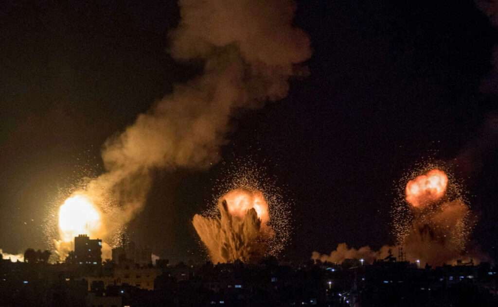 explosions in Khan Yunis in the southern Gaza Strip during Israeli air strikes on the Palestinian enclave