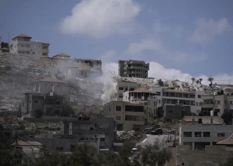 Israeli Forces Raid Jenin Camp, At Least 5 Palestinians Killed 1 Smoke rises from fighting between Israeli forces and Palestinian militants in the West Bank city of Jenin Monday, June 19, 2023.