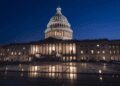 The Capitol is illuminated as the Senate works into the night to finish votes on amendments on the big debt ceiling and budget cuts package, at the Capitol in Washington, Thursday evening, June 1, 2023.