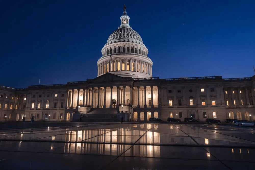 The Capitol is illuminated as the Senate works into the night to finish votes on amendments on the big debt ceiling and budget cuts package, at the Capitol in Washington, Thursday evening, June 1, 2023.