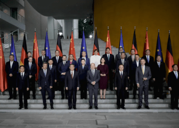 German Chancellor Olaf Scholz, front row center, and Chinese Premier Li Qiang, center left, pose with government members during consultations of the both countries at the chancellery in Berlin, Germany, Tuesday, June 20, 2023