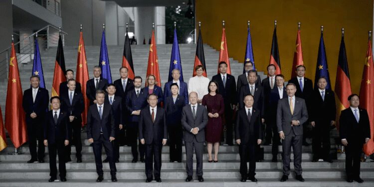 German Chancellor Olaf Scholz, front row center, and Chinese Premier Li Qiang, center left, pose with government members during consultations of the both countries at the chancellery in Berlin, Germany, Tuesday, June 20, 2023