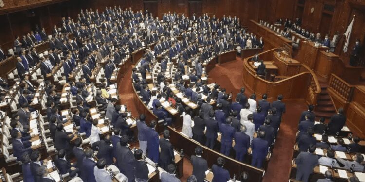 Japan’s Lower House Of Parliament Approves Bill To Promote LGBTQ+ Awareness 1 Japanese lawmakers stand as they approve a contentious awareness promotion bill for LGBTQ+ rights at the lower house in Tokyo Tuesday, June 13, 2023.