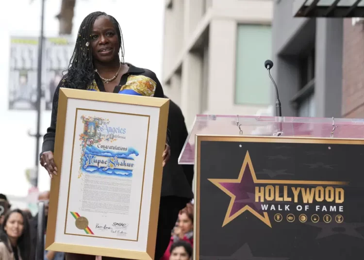 Tupac Shakur Receives Walk of Fame Star Honor In The Same Month As Birthday 1 Sekyiwa "Set" Shakur holds a plaque at a ceremony honoring her brother, the late rapper and actor Tupac Shakur