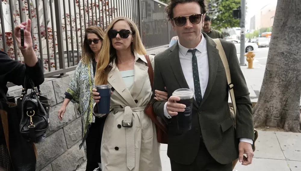 Danny Masterson, right, and his wife Bijou Phillips