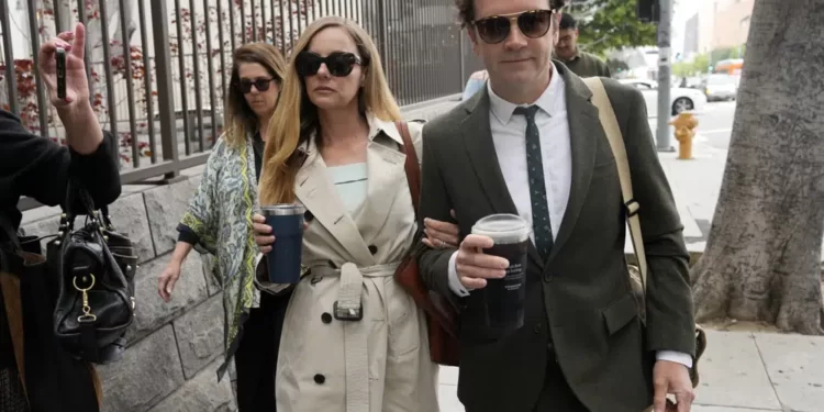 Danny Masterson, right, and his wife Bijou Phillips