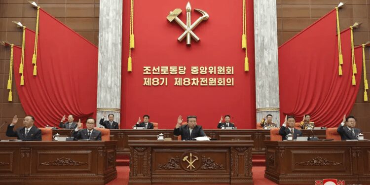 North Korea Vows To Make Second Attempt To Launch Spy Satellite 1 In this photo provided on June 19, 2023, by the North Korean government, North Korean leader Kim Jong Un, center, attends an enlarged plenary meeting of the ruling Workers’ Party’s Central Committee, which was held between June 16 and 18, at the party's headquarters in Pyongyang, North Korea.
