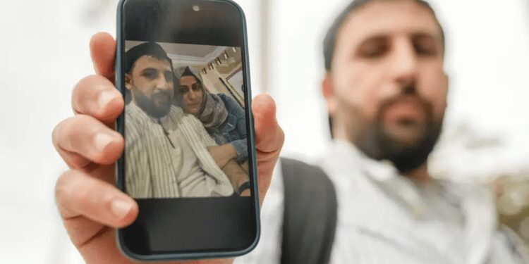 IOM Claims Greece Shipwreck Could Be The Second Deadliest In The Region 1 Kassem Abo Zeed holds up a photograph with his wife, Ezra, who is missing after a fishing boat carrying migrants sank off southern Greece, in the southern port city of Kalamata, Thursday, June 15, 2023.
