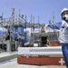 An employee of Tokyo Electric Power Company explains to the media about the facility to be used to release treated radioactive water at Fukushima Daiichi nuclear power plant in Fukushima, northern Japan, on June 26, 2023.