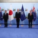 Beijing Warns Of Any NATO Expansion In Asia 10 Leaders from Asia pose for a group photo with NATO Secretary General Jens Stoltenberg in Vilnius.