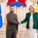 Slovakia's President Zuzana Caputova (R) welcomes Ukrainian President Volodymyr Zelenskyy during the welcome ceremony at the Presidential Palace on July 7, 2023.