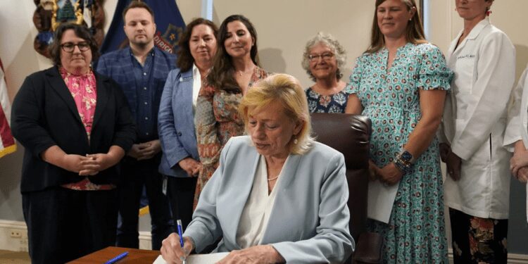 Maine Governor, Janet Mills signs into law a bill expanding access to abortions later in pregnancy on Wednesday, July 19, 2023.