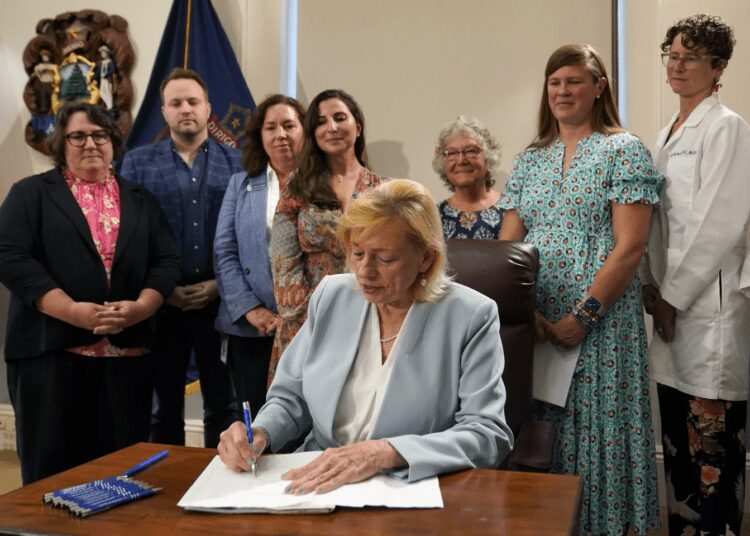 Maine Governor, Janet Mills signs into law a bill expanding access to abortions later in pregnancy on Wednesday, July 19, 2023.